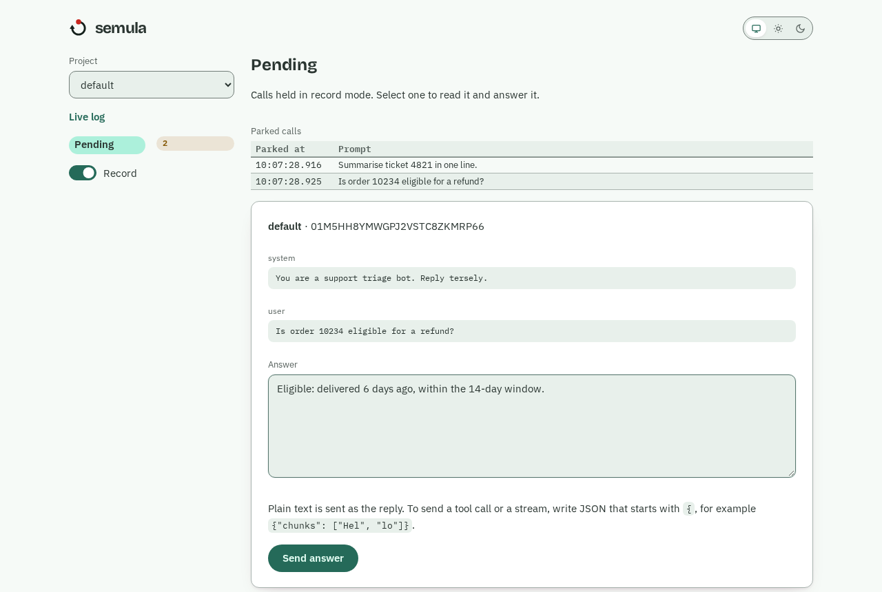 The Pending screen: two parked calls, one selected, with an answer typed in
